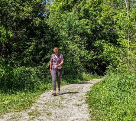 Woman hiking at Utopia Conservation Area summer